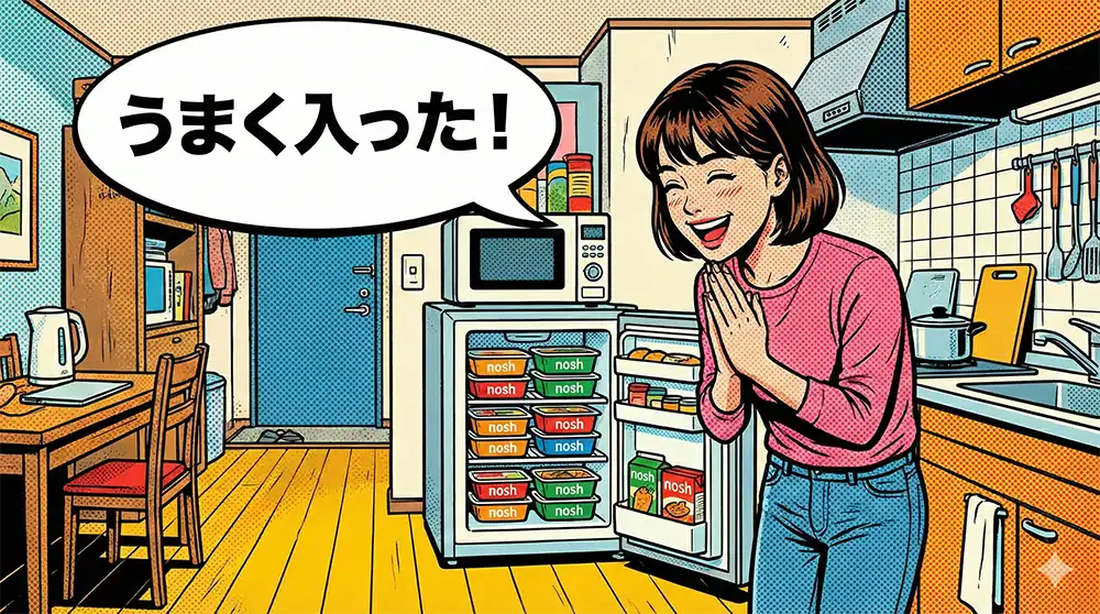 一人暮らしの女子大生、独身用の小さな冷蔵庫の冷凍庫にナッシュをうまく収納できて喜んでいる場面